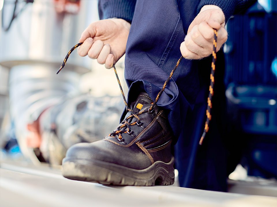 unrecognizable manual worker typing shoelace at co 2024 12 13 18 11 29 utc